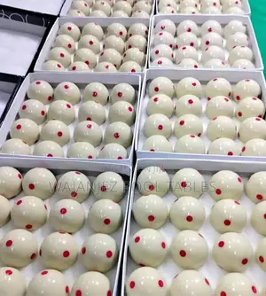 White Ball With a Red Dot