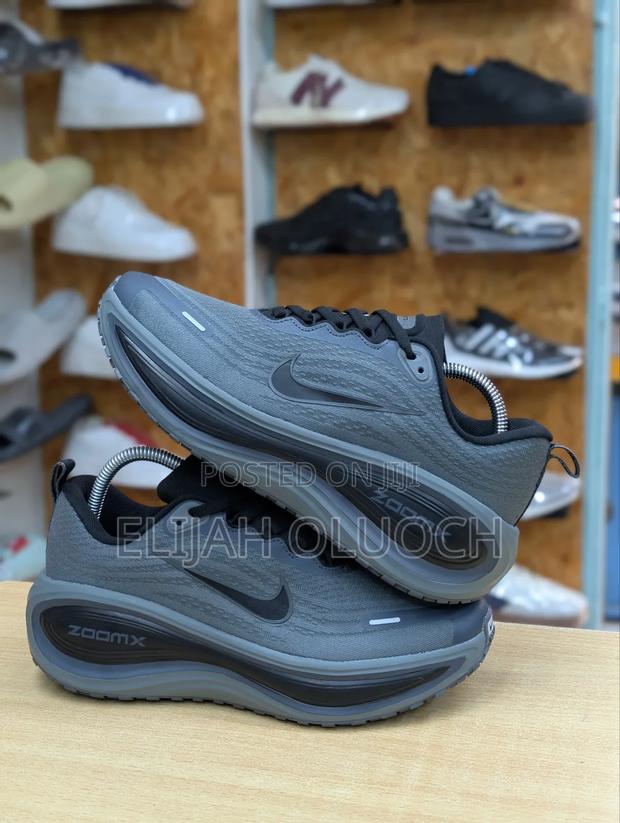 Grey Nike Vamero Plus Men Running - main view