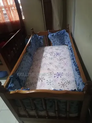 A Baby Cot Quick Sale