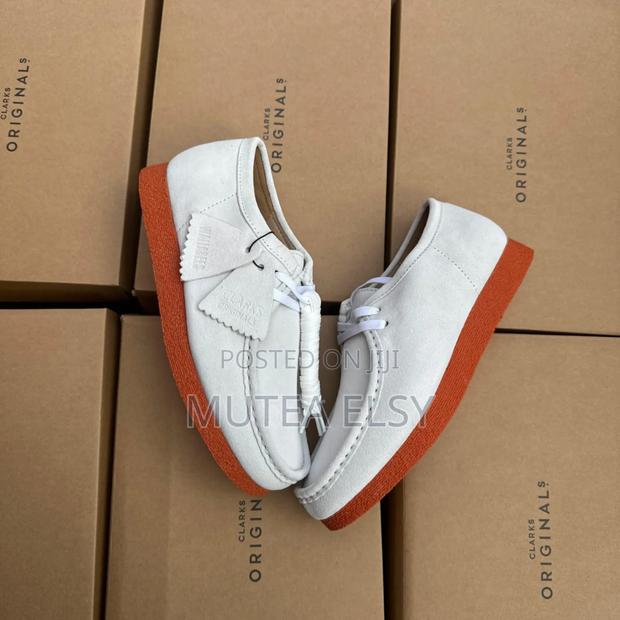 Gold White Clarks Originals Wallabees