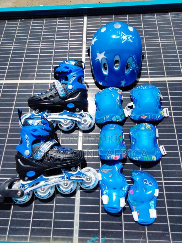 Adjustable Hard Boot Roller Skates With Guards And Helmets - thumbnail 2