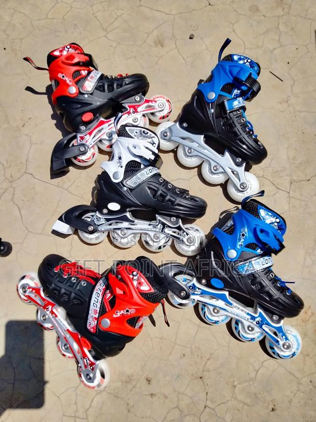 Adjustable Hardboot Rollerskates With Rubber Wheels Helmet And Guards - thumbnail 2