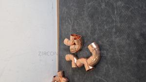 Efficient Flow Control – Copper Elbow - main view