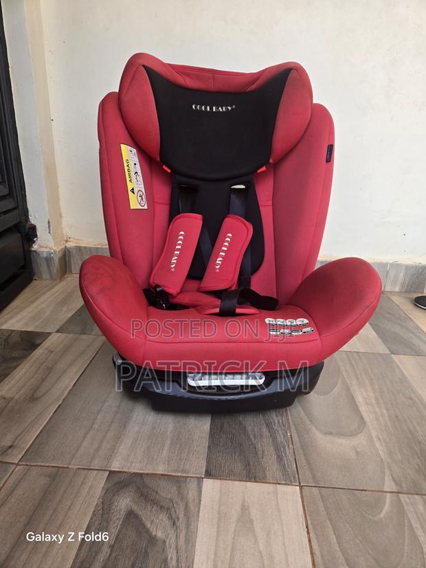 Red Cool Baby Car Seat With a Reclining Base