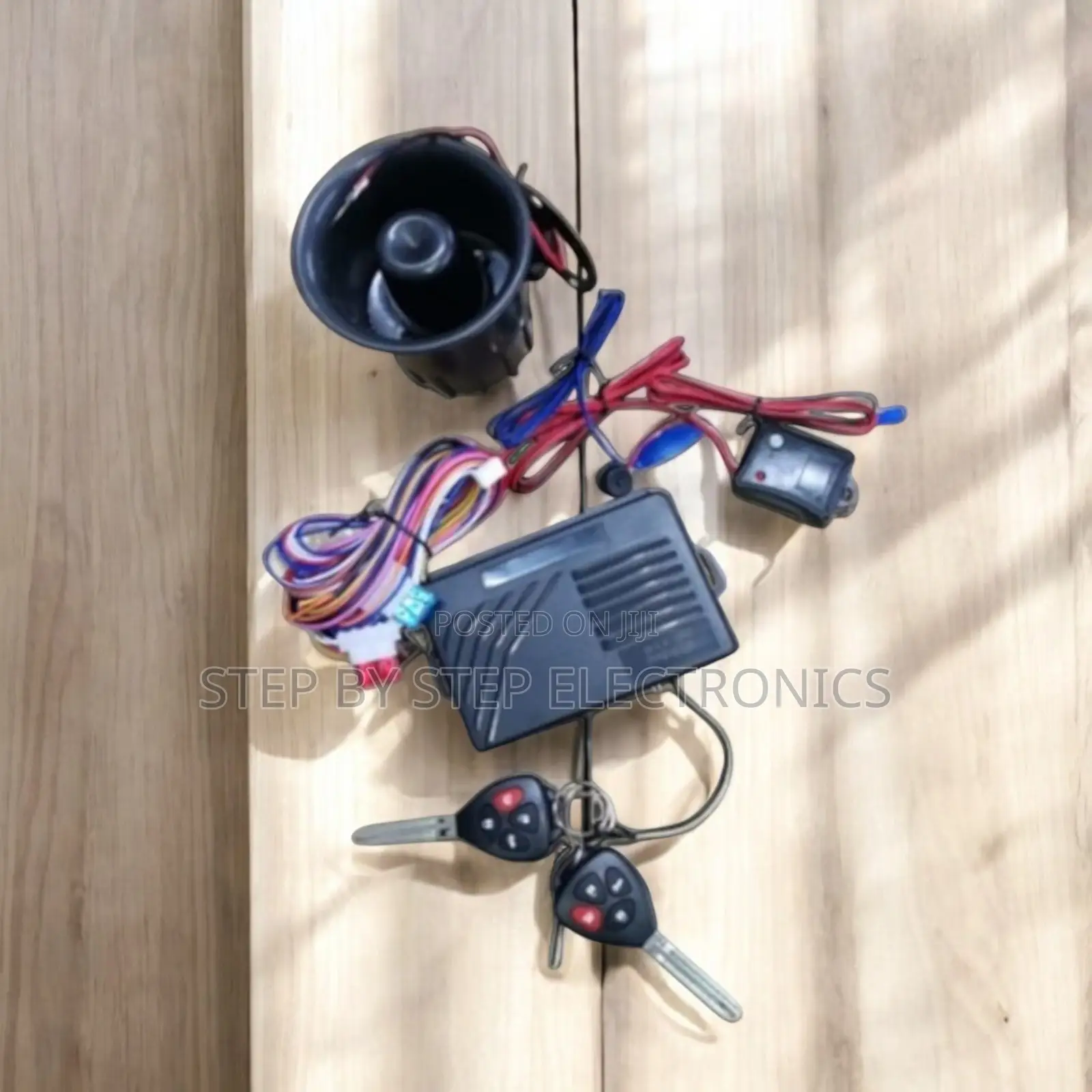 Inexpensive Car Alarm System With Loud Siren and Flip Key Remotes