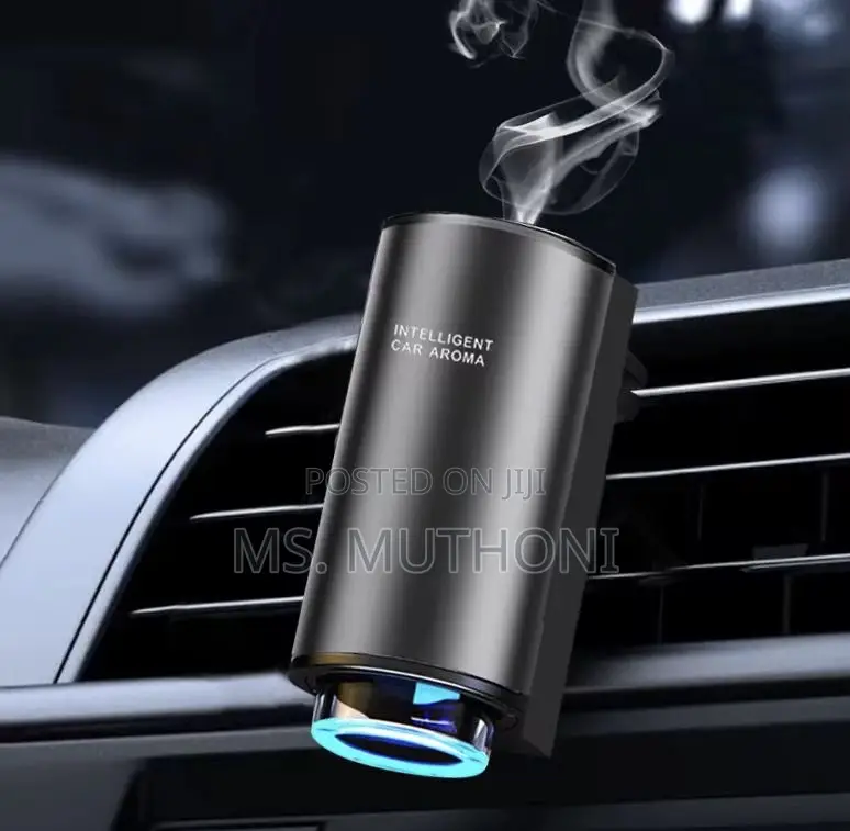Smart Car Aroma Diffuser + 3 Refill Bottles and Usb Charging Cable.