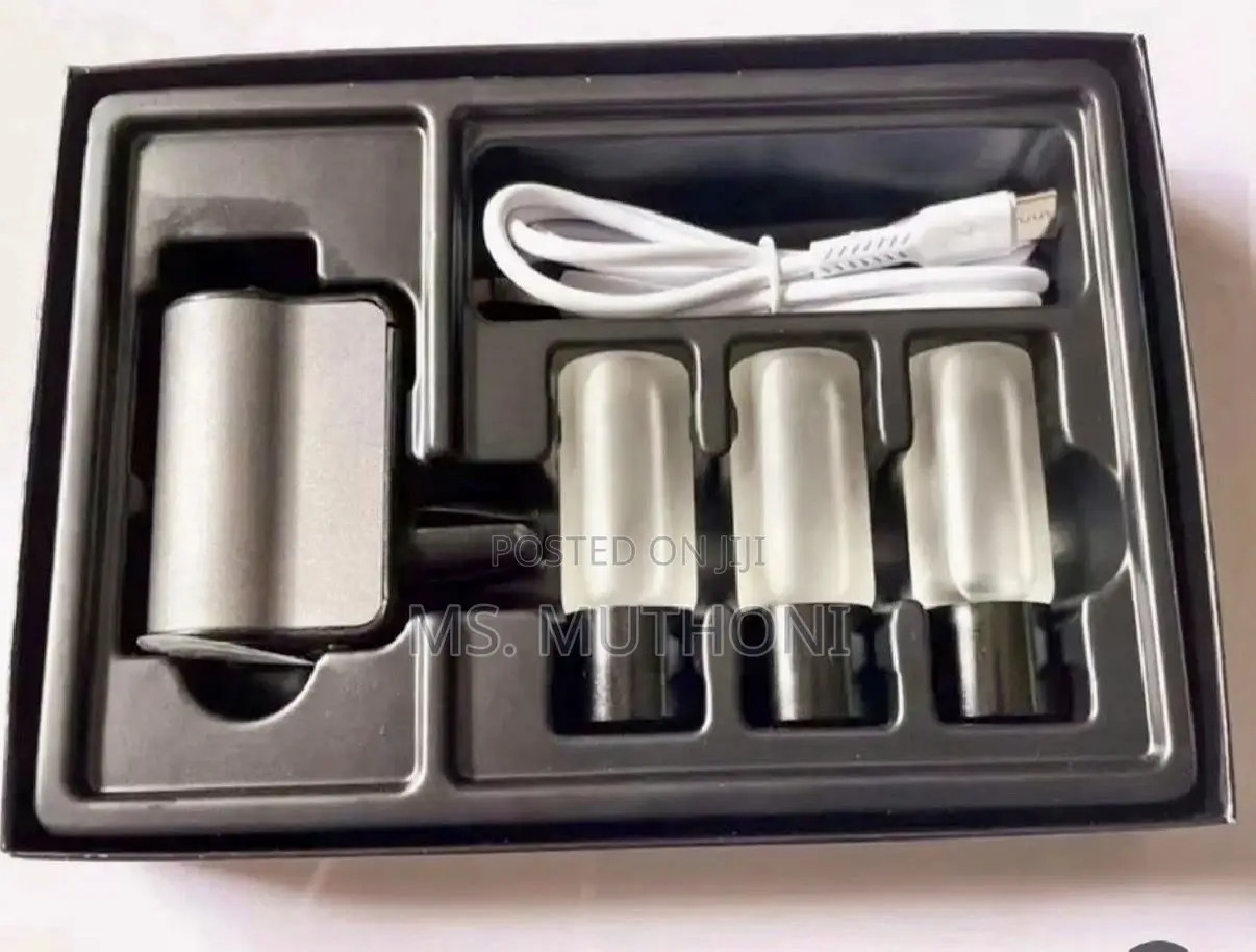 Smart Car Aroma Diffuser + 3 Refill Bottles and Usb Charging Cable.
