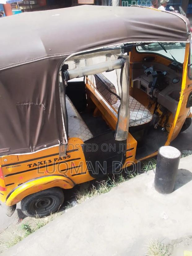 Bajaj RE 2020 Yellow - thumbnail 3