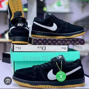 Nike Sb Dunk Low Pro in a Black, White, and Gum - thumbnail 2