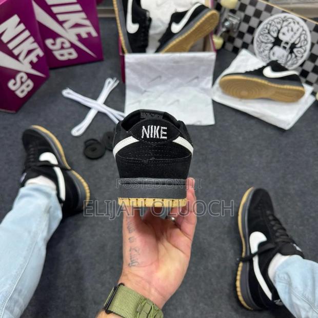 Nike Sb Dunk Low Pro in a Black, White, and Gum - thumbnail 5