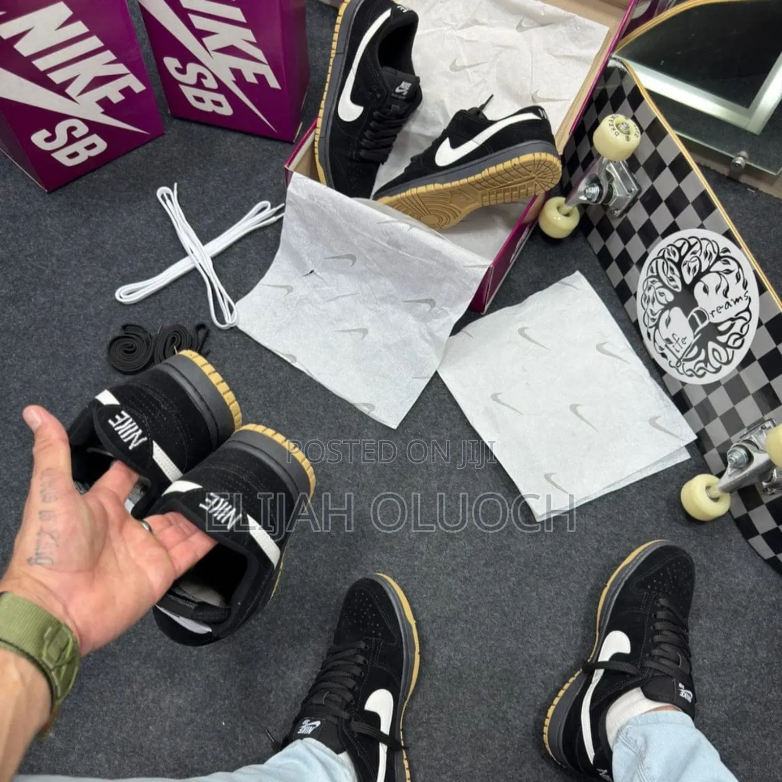 Nike Sb Dunk Low Pro in a Black, White, and Gum
