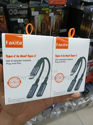 This Is a Faxite Type-C to Dual Type-C Aux Headset Adapter.