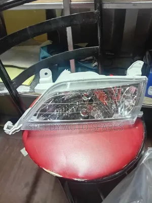 Headlight Carina Ti