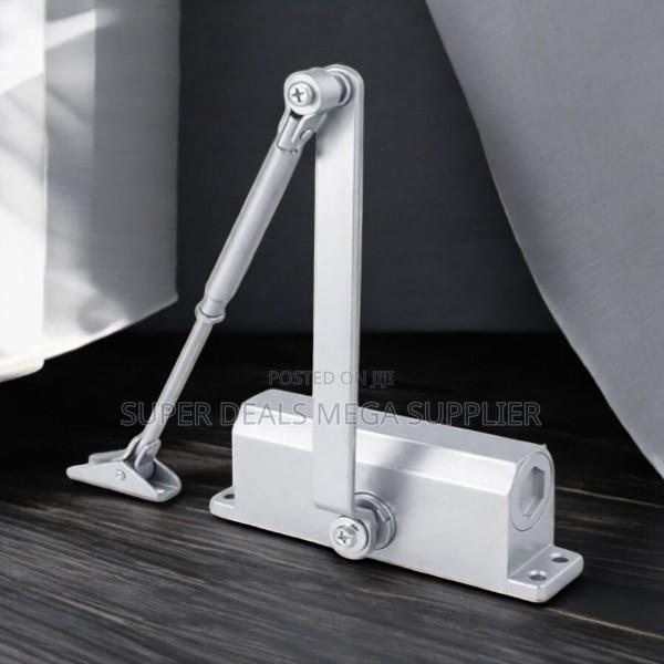 Automatic Door Closing Device With Adjustable Speed and Tension
