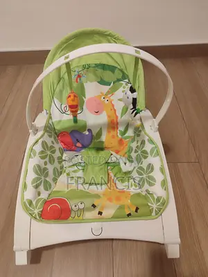 Baby Rocker With Toy Bar and Vibrations