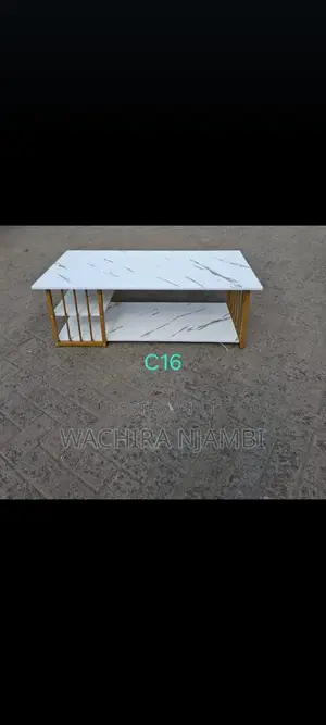 Modern White Faux Marble Coffee Table With Gold Frame.