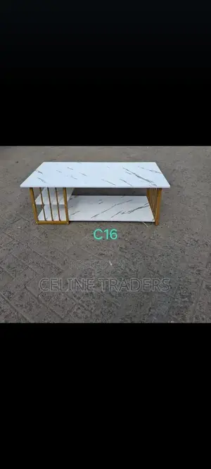 Modern White Faux Marble Coffee Table With Gold Frame.