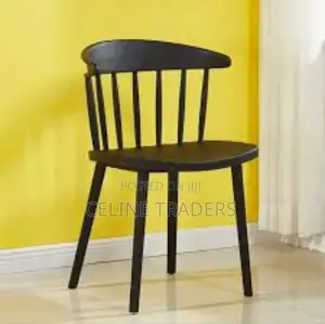 Modern Plastic Dining or Office Chair With a Spindle Back Design