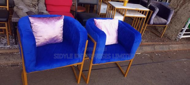 Blue Styling Chair With Throw Pillows