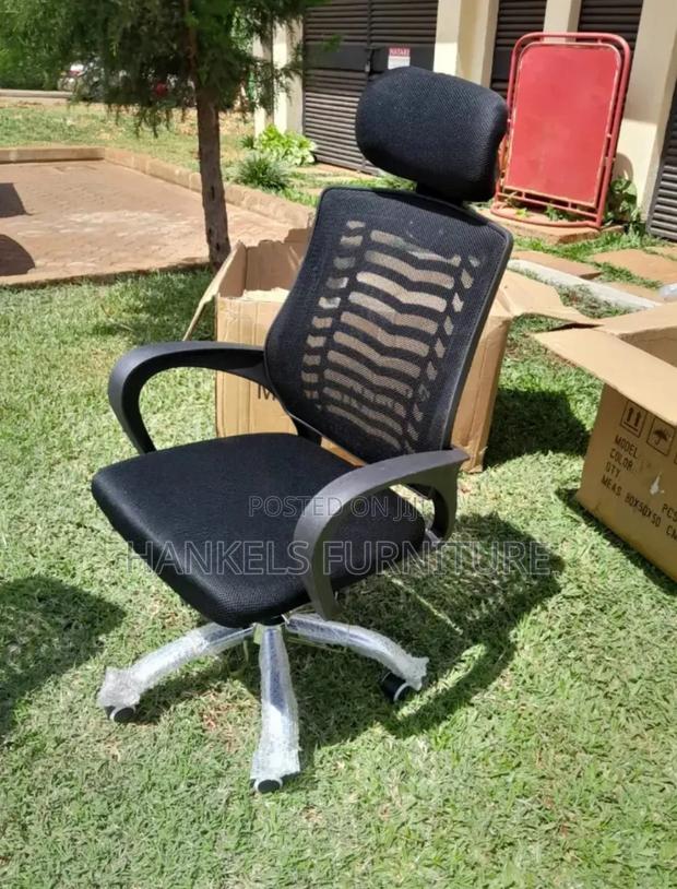Ergonomic Swivel Adjustable Height Chair With Head Support
