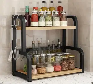 Two-Tier Stainless Steel Kitchen Storage Rack With Wooden Shelves.