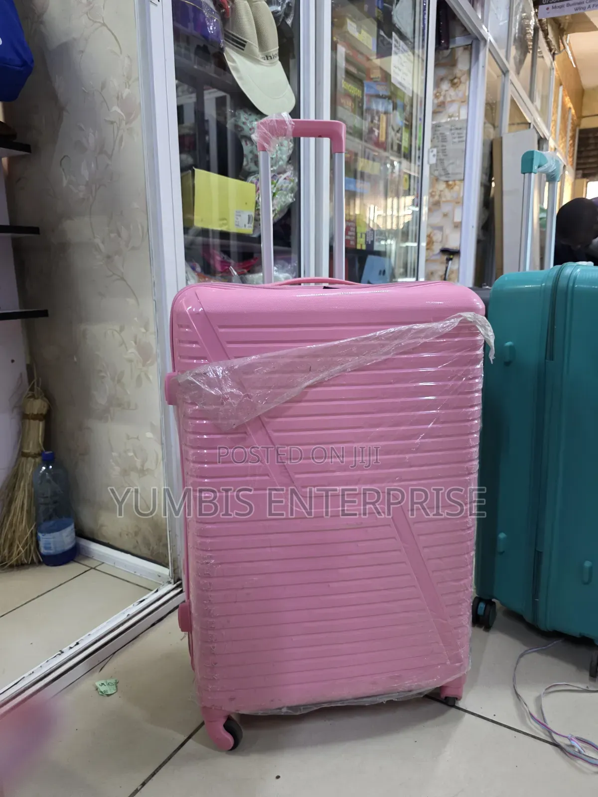 Hot Pink Rubber Suitcase at 3900 Large