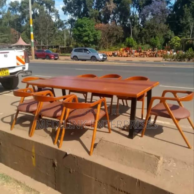 Camel Back Chairs 8-Seater Dinning Table Set - main view