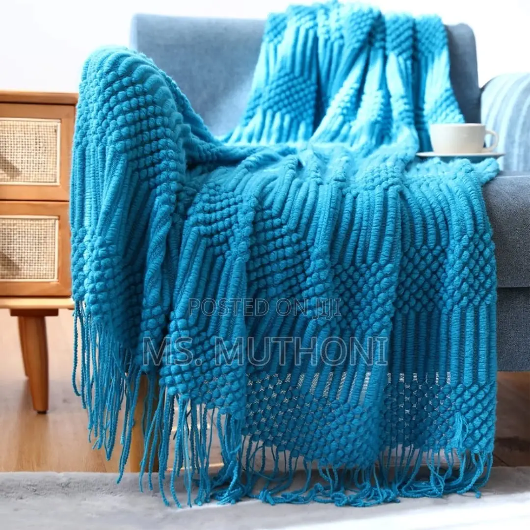 Textured Soft Knitted Throw Blanket With Tassels.