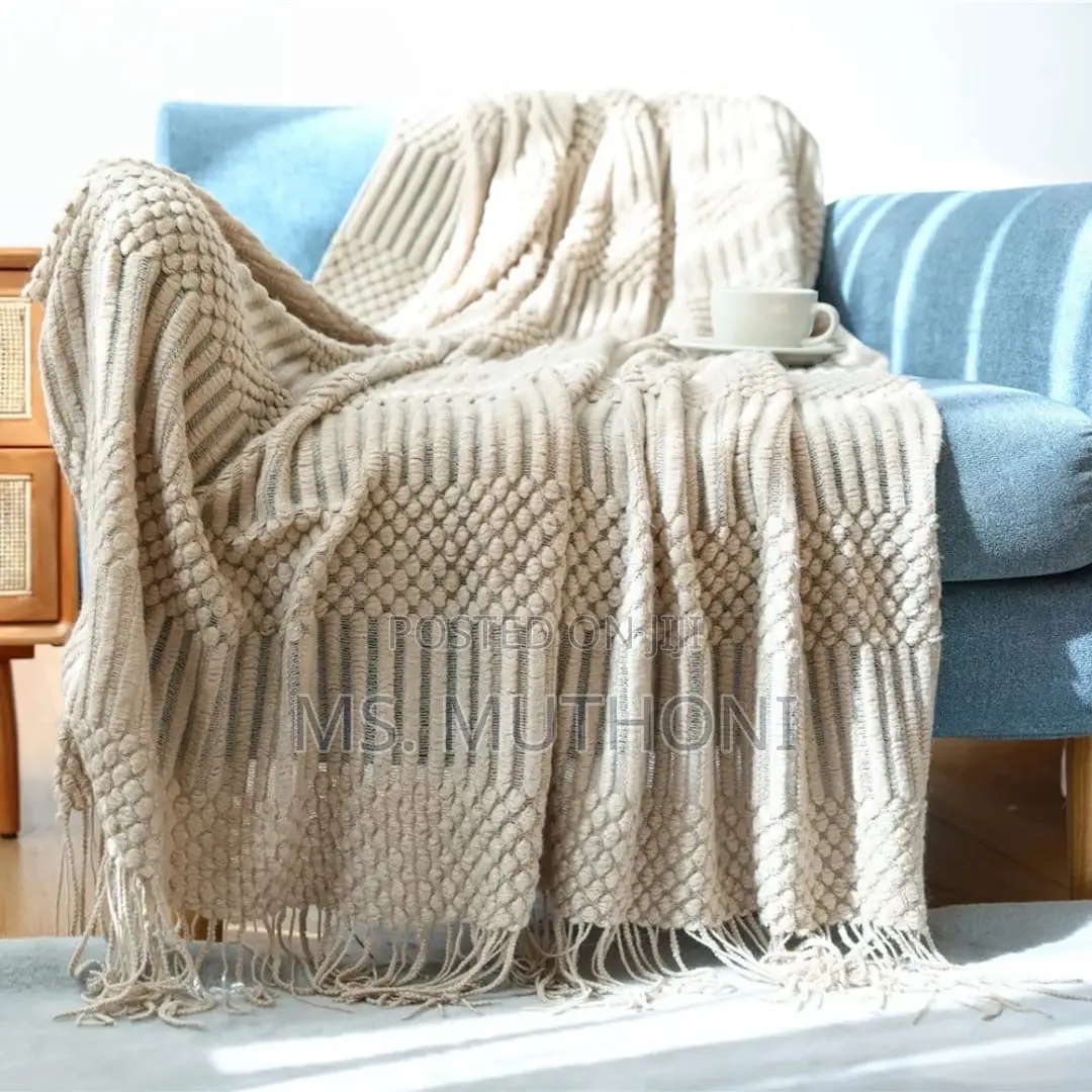 Textured Soft Knitted Throw Blanket With Tassels.