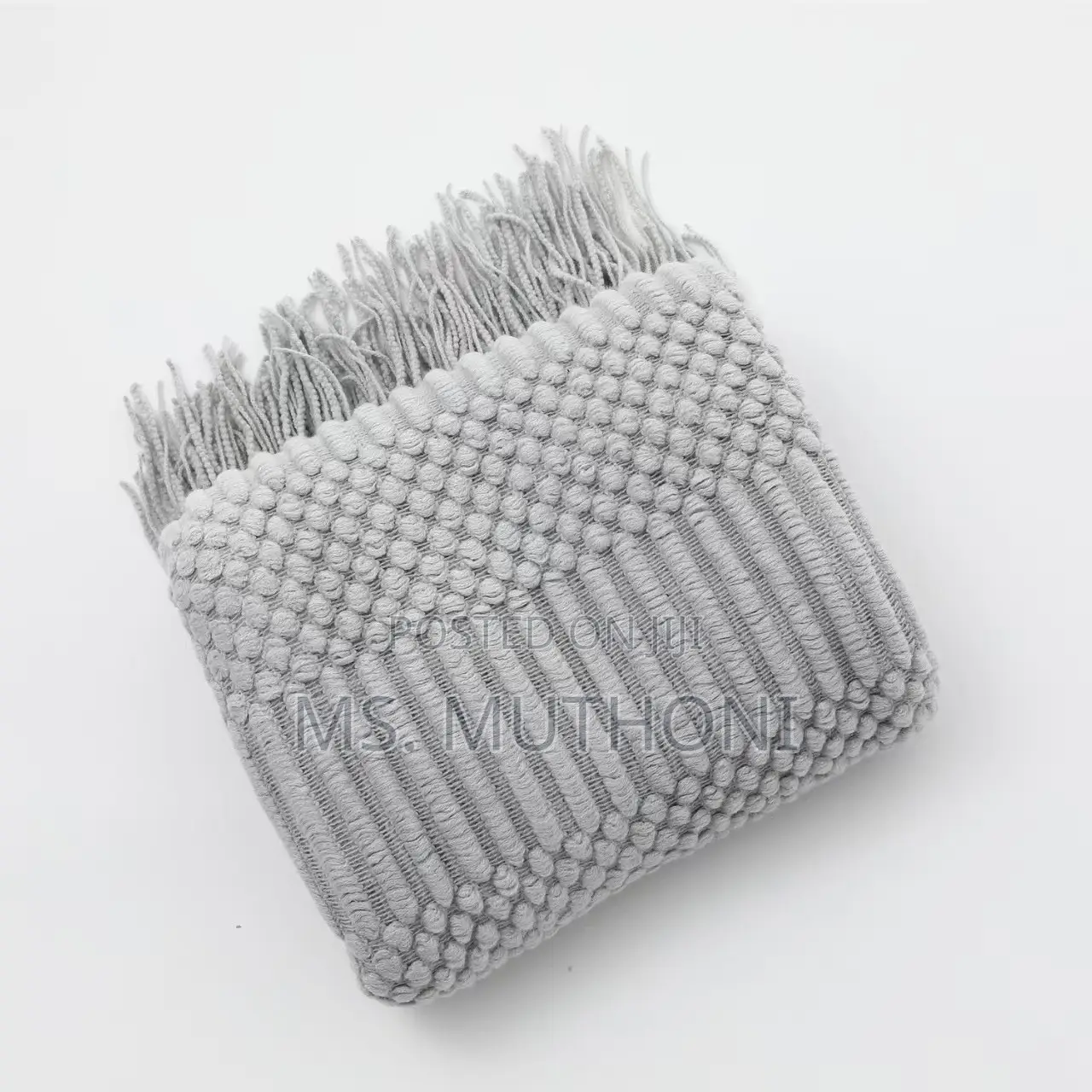 Textured Soft Knitted Throw Blanket With Tassels.