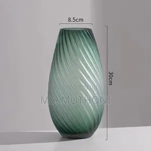 Sand Ripple Matte Ombre Glass Vase in Green With a Spiral Texture.