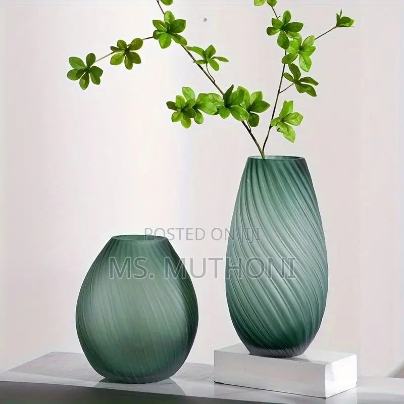 Sand Ripple Matte Ombre Glass Vase in Green With a Spiral Texture.
