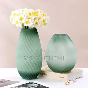 Sand Ripple Matte Ombre Glass Vase in Green With a Spiral Texture.