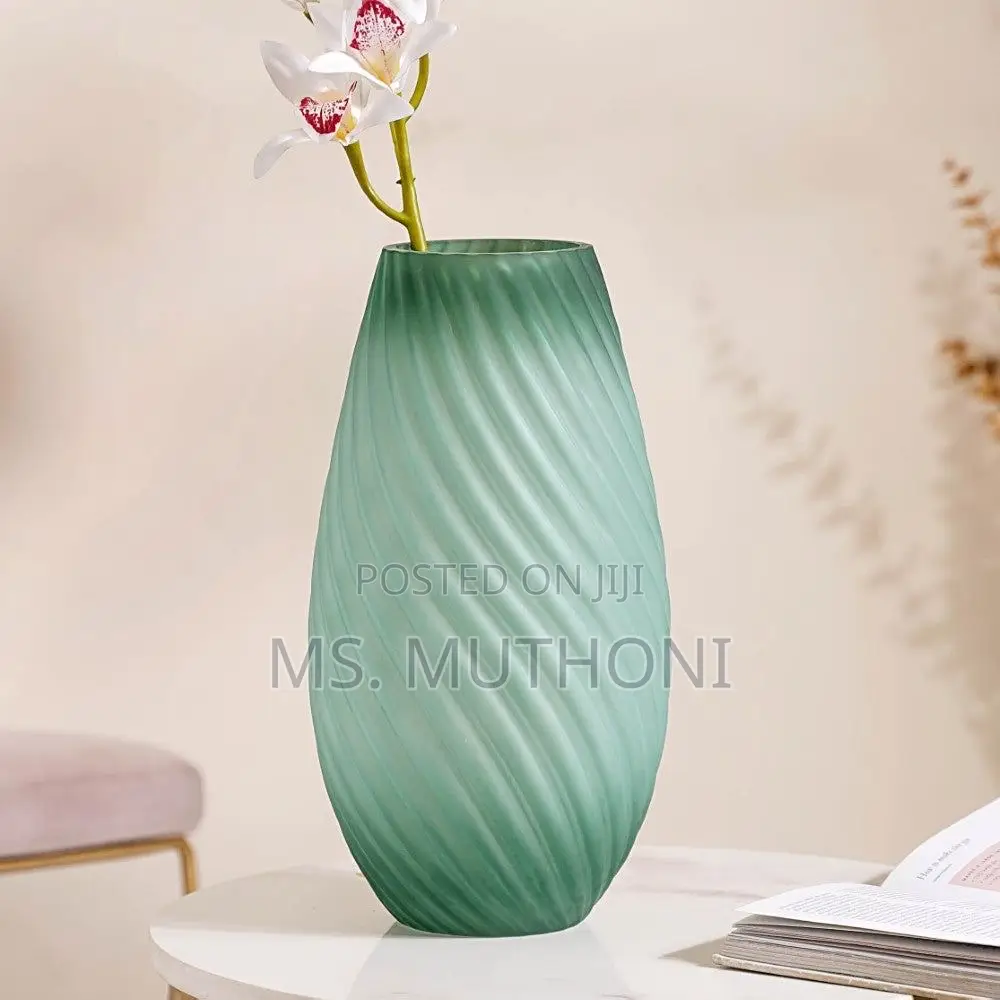 Sand Ripple Matte Ombre Glass Vase in Green With a Spiral Texture.
