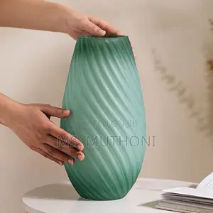 Sand Ripple Matte Ombre Glass Vase in Green With a Spiral Texture.