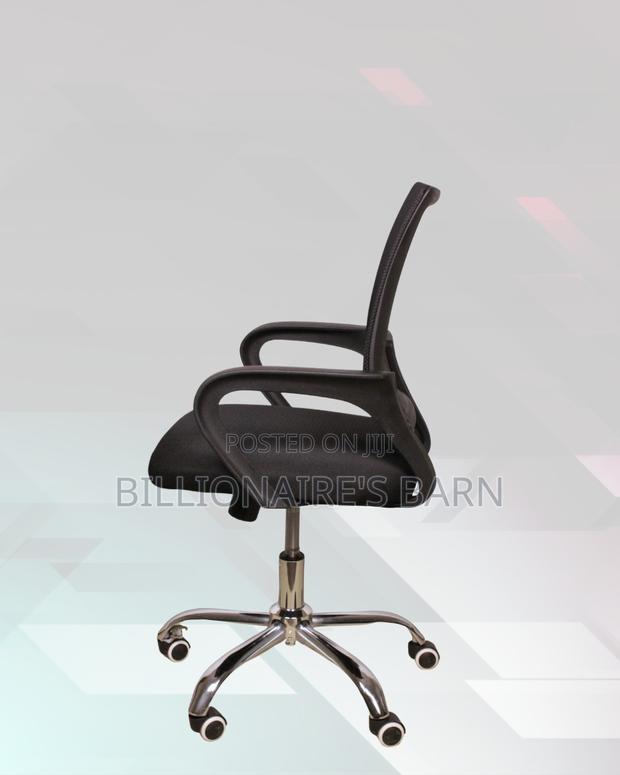 Black Compact Ergonomic Chair | Breathable Support for Long Desk Hours