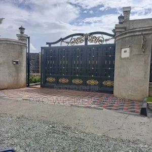 Modern Steel Swing Gates – Custom Designs Available