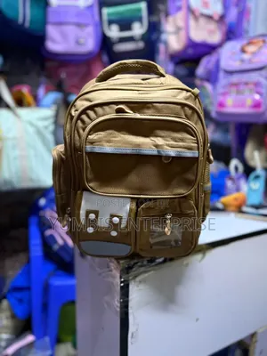Brown Backpack Grade 1,2,3 at 1200 Each