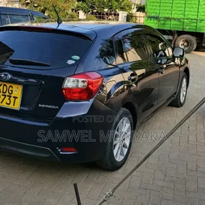 Subaru Impreza 2.0i Limited PZEV 4dr Hatchback AWD (2.0L 4cyl CVT) 2014