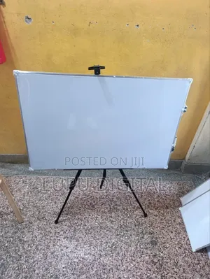White Boards and Metalic Stand.