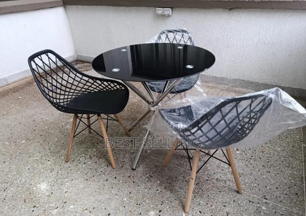 Dark Coffee Table and Black Eames Mesh Chair