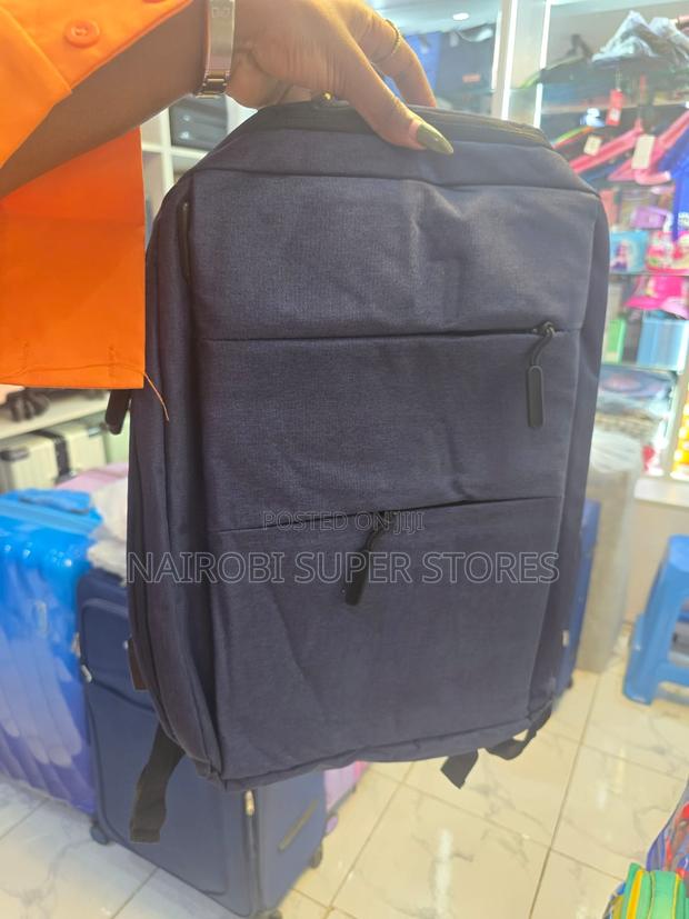 Minimalist Dark Blue Travel Backpack With Dual Front Compartments
