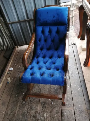 Upholstered Mahogany Rocking Chairs