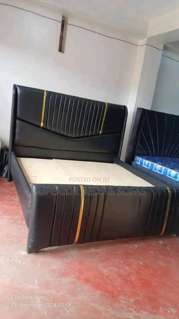 Black Upholstered Bed With Gold Trim- Size 5 by 6 - main view