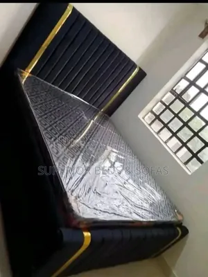 5 by 6 Black Upholstered Bed + Mattress