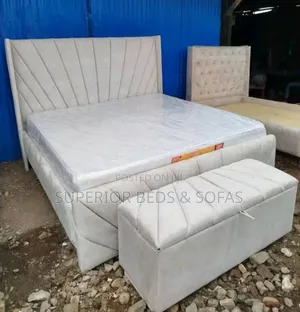 Cream Upholstered Bed Size 5 by 6.