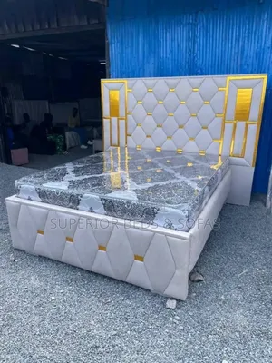 Luxury Upholstered Bed With Gold Accents 5 by 6