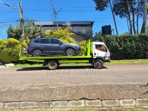 Karen Flatbed Towing- Sliding Bed