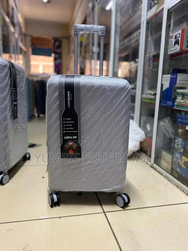 Small Gray Light Rubber Suitcase (2000 KSH - thumbnail 2