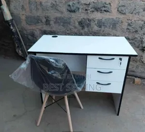 White Stalkable Office Desk With Black Eames Chairs